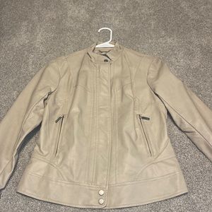 Cream colored pleather jacket. Barely worn. Size small